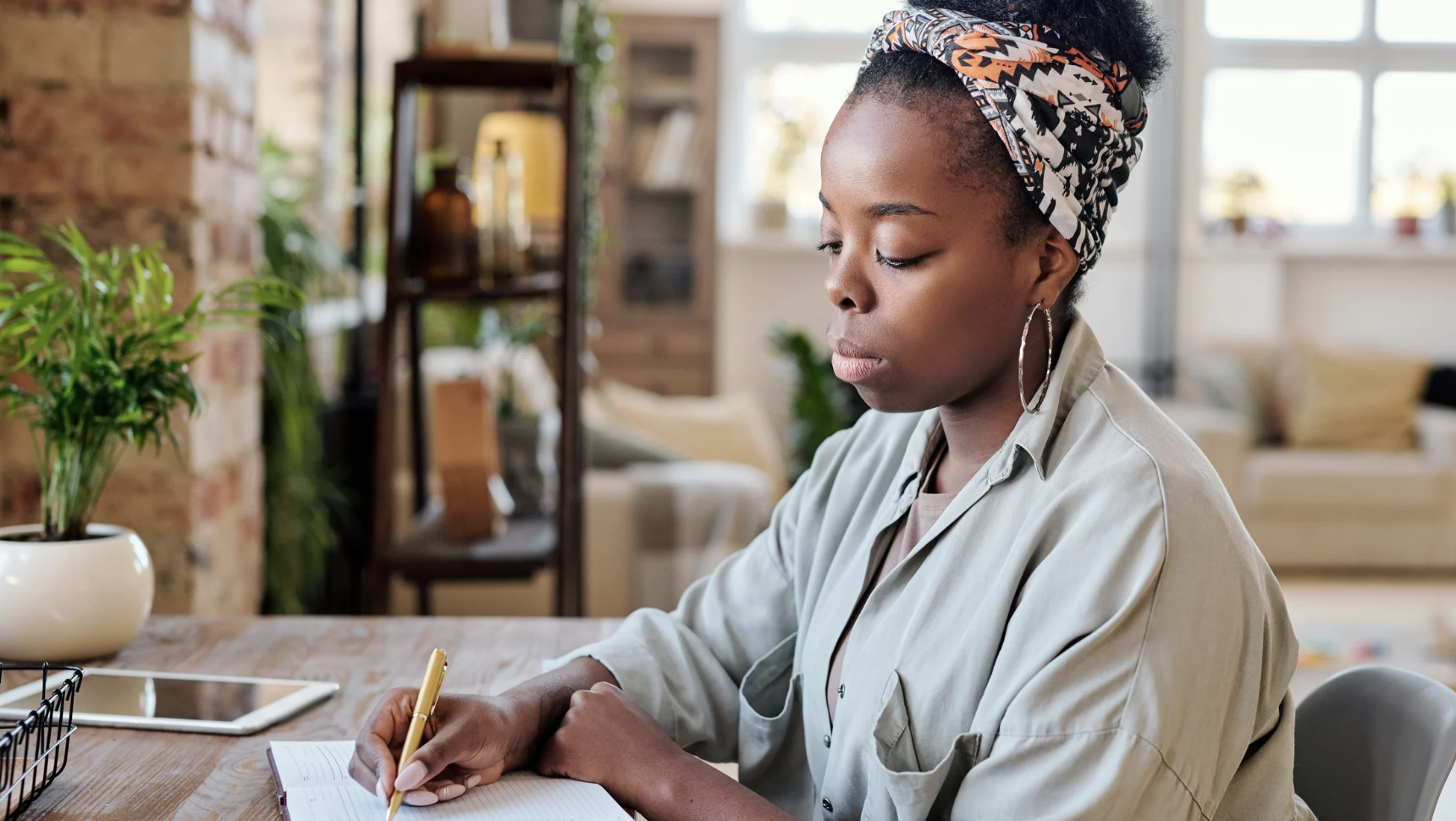 Woman Writing Secondary Signs