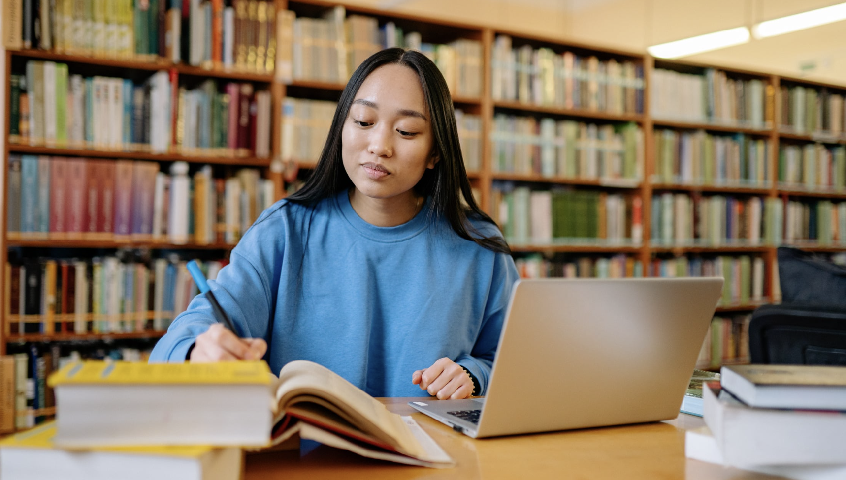 Woman Researching Secondary Signs